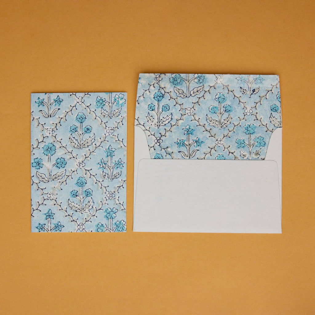 Carte fleurie – Treillis jardin bleu