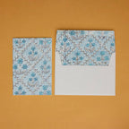 Carte fleurie – Treillis jardin bleu