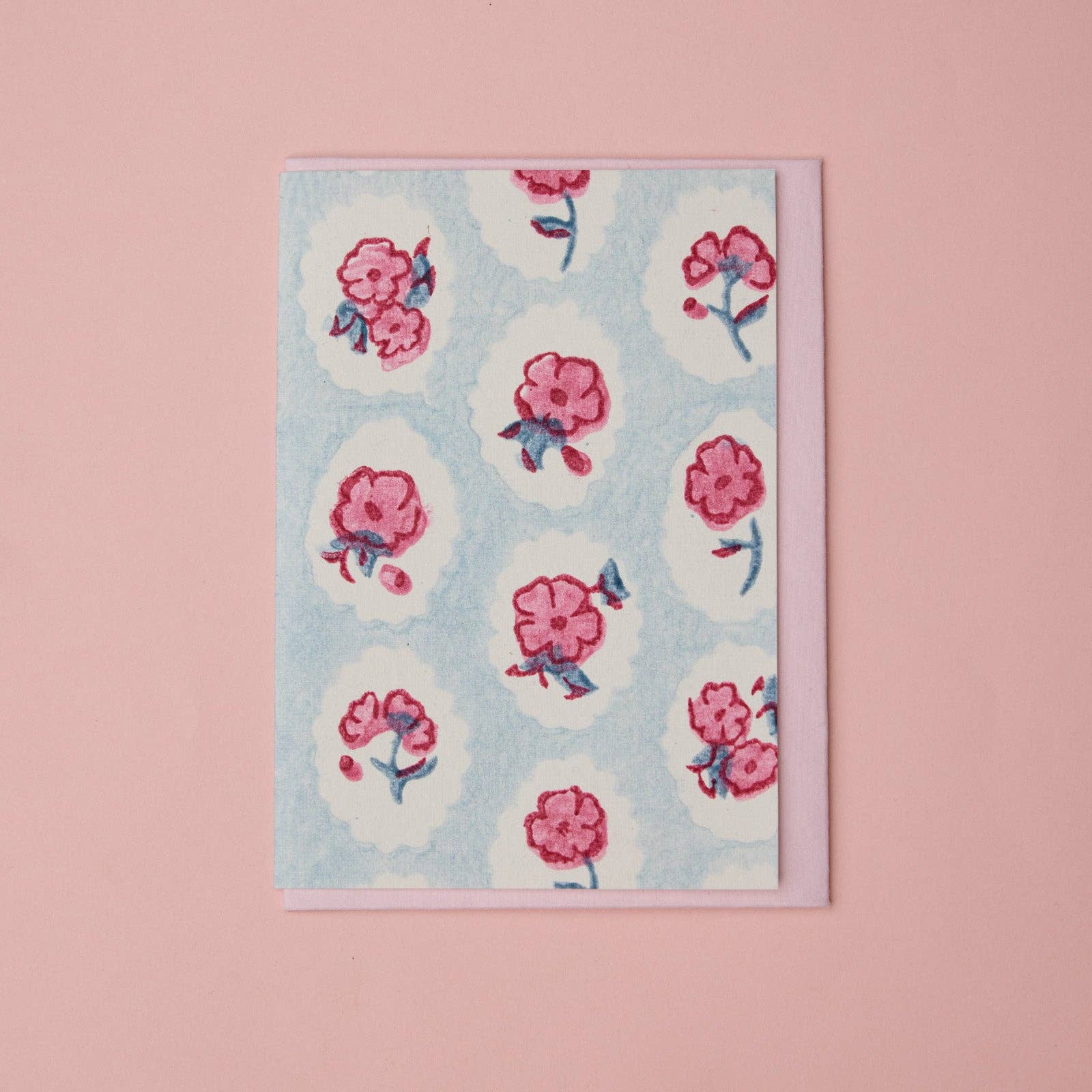 Carte fleurie – Fleurs roses sur fond bleu