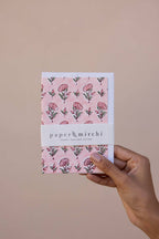 Carte fleurie – Petites fleurs sur fond rose poudré