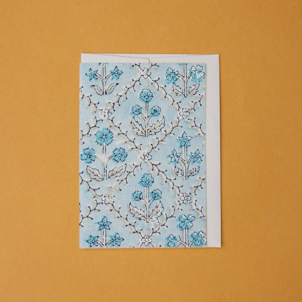 Carte fleurie – Treillis jardin bleu