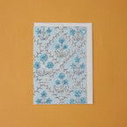 Carte fleurie – Treillis jardin bleu